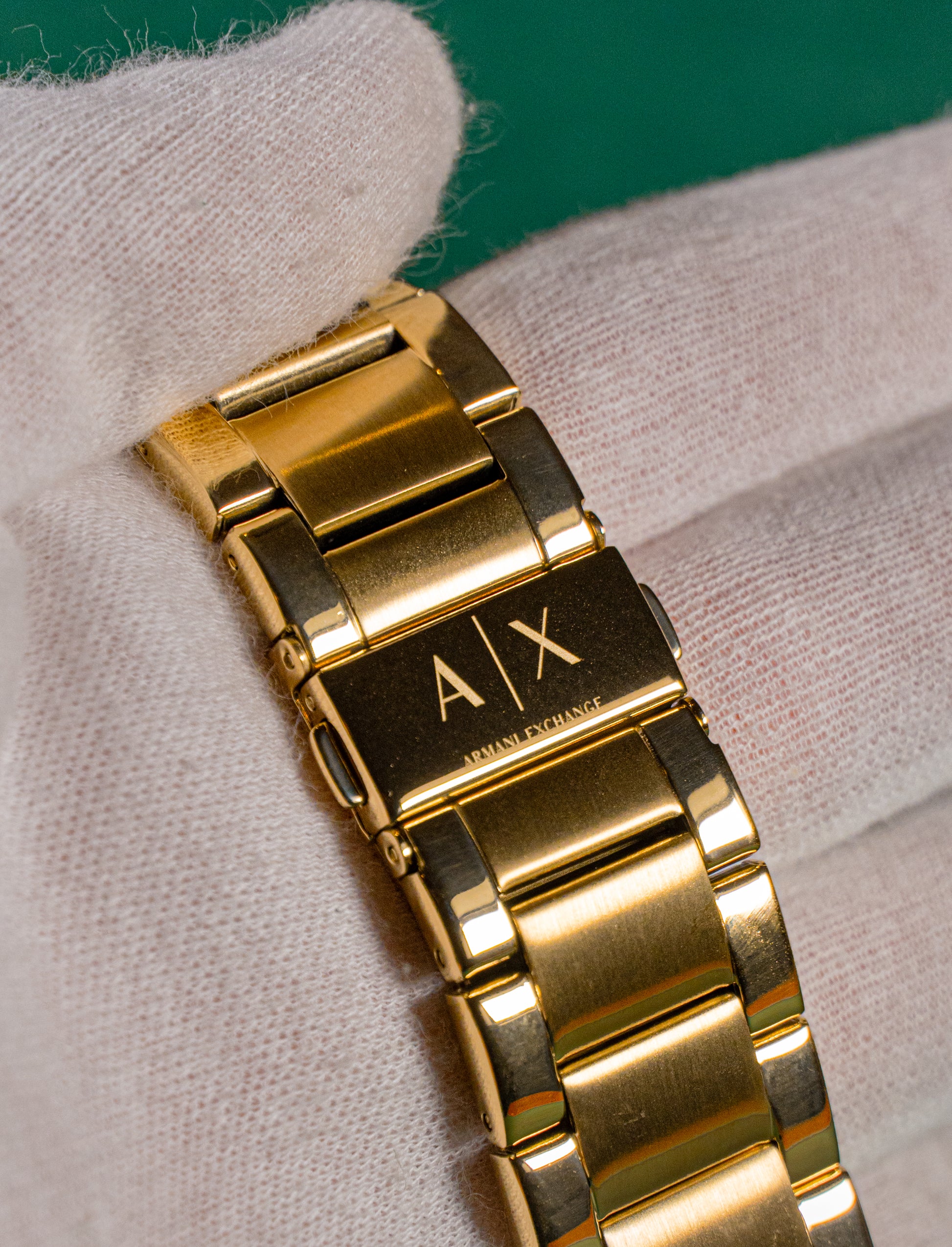 ARMANI EXCHANGE - GOLD TONE BLACK DIAL